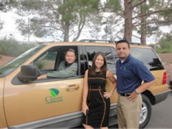 Classic Landscapes and Tree Solutions vice presidents Matt Borkowski, left, and Pete Luna chat with Homeowner Talk TV Executive Producer Andrea Behrens.