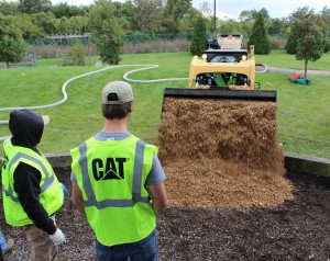 As part of PLANET Gives Back, a playground at Home of the Innocents gets new mulch. Photo: Sarah Pfledderer.