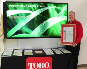 On behalf of Toro, Robert Starr, of the company’s water management group, is recognized for promoting ‘Smart Irrigation Month.’ Photo: Toro.