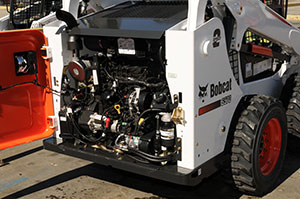 Many engine components in the new Bobcat Tier 4 loaders are easily serviced by opening the tailgate.