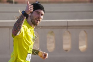 A Ewing participant gives a thumbs up while running the marathon. Photo: Ewing