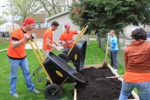 Case workers participate in the Victory Garden Blitz in Milwaukee.