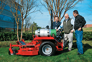 John Watson (center), owner of Common Grounds Landscape Management, shows off his company’s Snapper Pro S200xtp propane-fueled mower to environmentally focused customers Randy Holloway (left) with Jones Lang LaSalle, and Mark Harvey with Cowperwood Co.