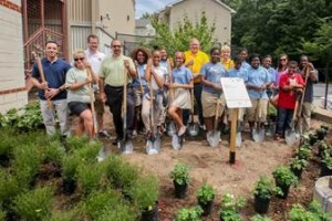 Students, industry experts, UDC Master Gardeners and Bayer employees plant a pollinator garden at The SEED School of Washington, D.C.