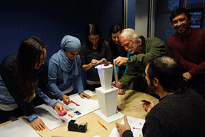 Nemetschek Vectorworks employees work together to build a Red Hots tower for the annual Gingertown event in Washington, D.C. Photo: Nemetschek Vectorworks