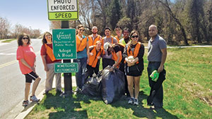 Employees at Nemetschek Vectorworks organize an outing each quarter to clean up their designated road for the Adopt- A-Road project.