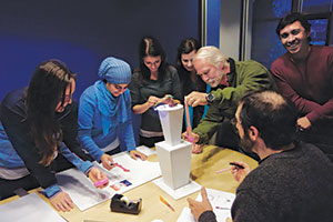 Nemetschek Vectorworks employees work together to build a Red Hots tower for the annual Gingertown event in Washington, D.C.