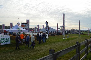 Attendees pace the aisles of the outdoor demo area, where more than 70 companies exhibited.