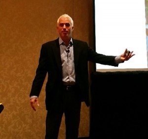 Jeffrey Scott speaks to guests about operating a successful company.