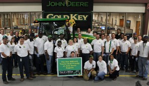 John Deere—Augusta employees surround the 1 millionth tractor built at the factory. Photo: John Deere