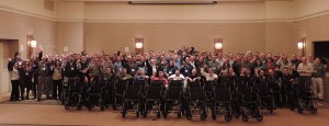 At its annual sales conference, SavATree arborists built and donated wheelchairs to 30 senior citizens. Photo: SavATree