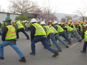Heads Up employees stretch together as part of the company's 2015 Equipment Rodeo. Photo: Heads Up