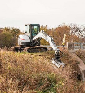 Flail_Mower_Cutting_Grass_by_Bridge-204652.105644