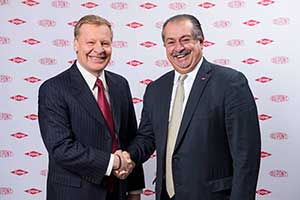 Edward Breen (left), chairman and CEO of DuPont, and Andrew Liveris, president chairman and CEO of Dow.