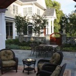 The space within the confines of the walled courtyard is equally suited for entertaining large groups or small, intimate gatherings.