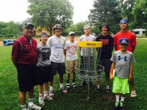 Belle Plaine, MN volunteers and local children gather to transform Court Square Park into a disk golf course for the entire community to enjoy.