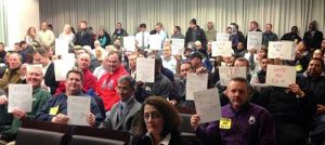 Opponents of Bill 52-14 attend a Montgomery County, Md., council meeting discussing a proposed cosmetic pesticide ban. The bill passed in October.