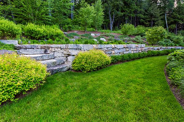 After shot of granite and stone retaining wall