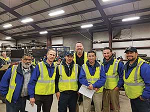 Chris Strempek and Gene Freeman with crew members