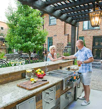Owners in outdoor kitchen