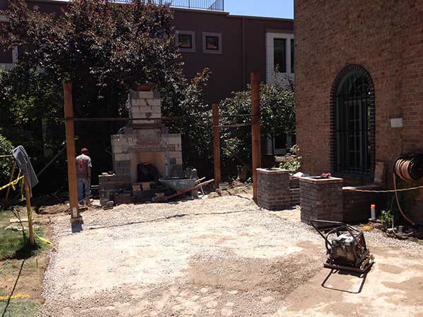 Construction of fireplace, pergola and dining patio