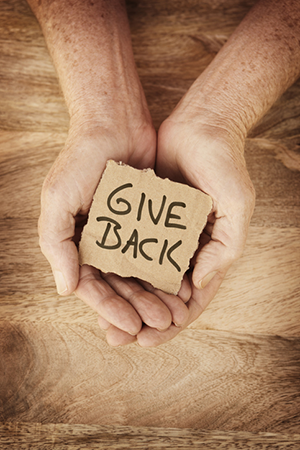 Giving back | Photo: iStock.com/hidesy