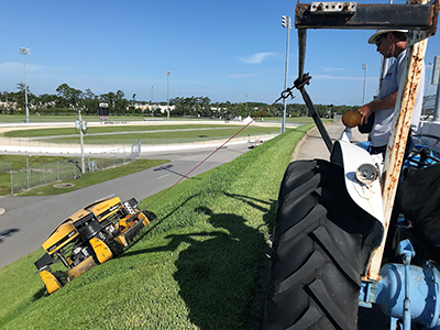 The Spider 2 mowing the banks at Daytona International Speedway. (Photo provided by Dvorak)
