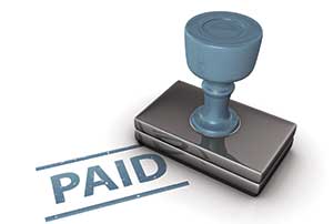 Paid stamp Photo: ©istock.com/jimmyjamesbond