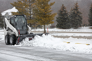 Oscillating skid-steer mount (Photo: SnowEx)