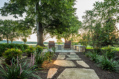 Riverfront mansion. Contractor: GoldGlo Landscapes (Photo: ICPI)