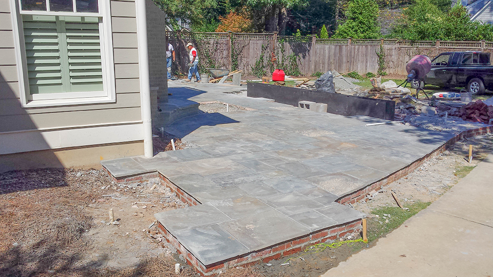 Installation of bluestone patio (Photo: Dry Branch Photography)