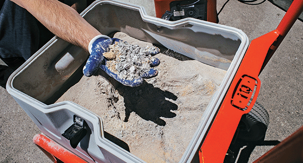 Hand holding dust (Photo: iQ Power Tools)