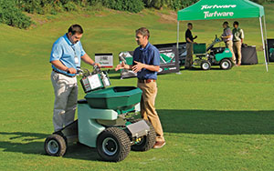 Shiplov gives a demo of PermaGreen’s spreader-sprayer. (Photo: Seth Jones)
