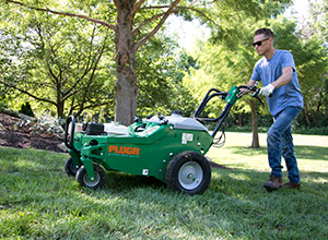 Man aerating (Photo: Billy Goat Industries)