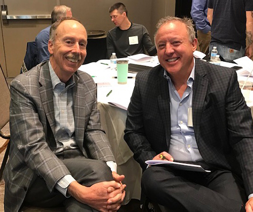 Joe Burns (CEO of Colorburst, Atlanta) talking with Michael Hommel at the conference. Photo: Jeffrey Scott