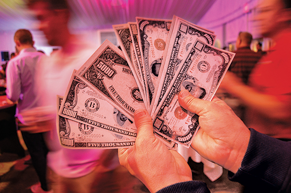 Fake $5,000 bills (Photo: Ryan Gerard)