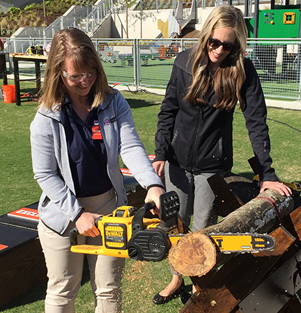Sarah Webb demoing chainsaw (Photo: LM Staff)