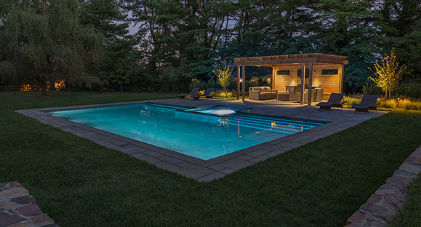 View of pool at night (Photo: Ledden Palimeno Landscape Co.)