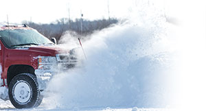 Plow truck and snow (Photo: iStock.com/skhoward)