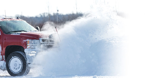 Plow truck and snow (Photo: iStock.com/skhoward)