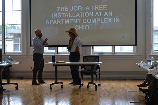 Marty Grunder and Nathan Cornett of LaBahn's Landscaping in the Greater San Diego area act out a sales situation. (Photo: LM Staff)