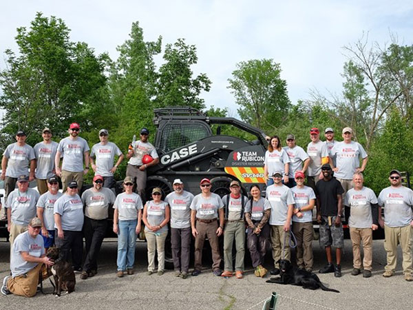 Team Rubicon members assist in cleaning up the aftermath of tornadoes in Dayton, Ohio. (Photo: Case Construction Equipment)