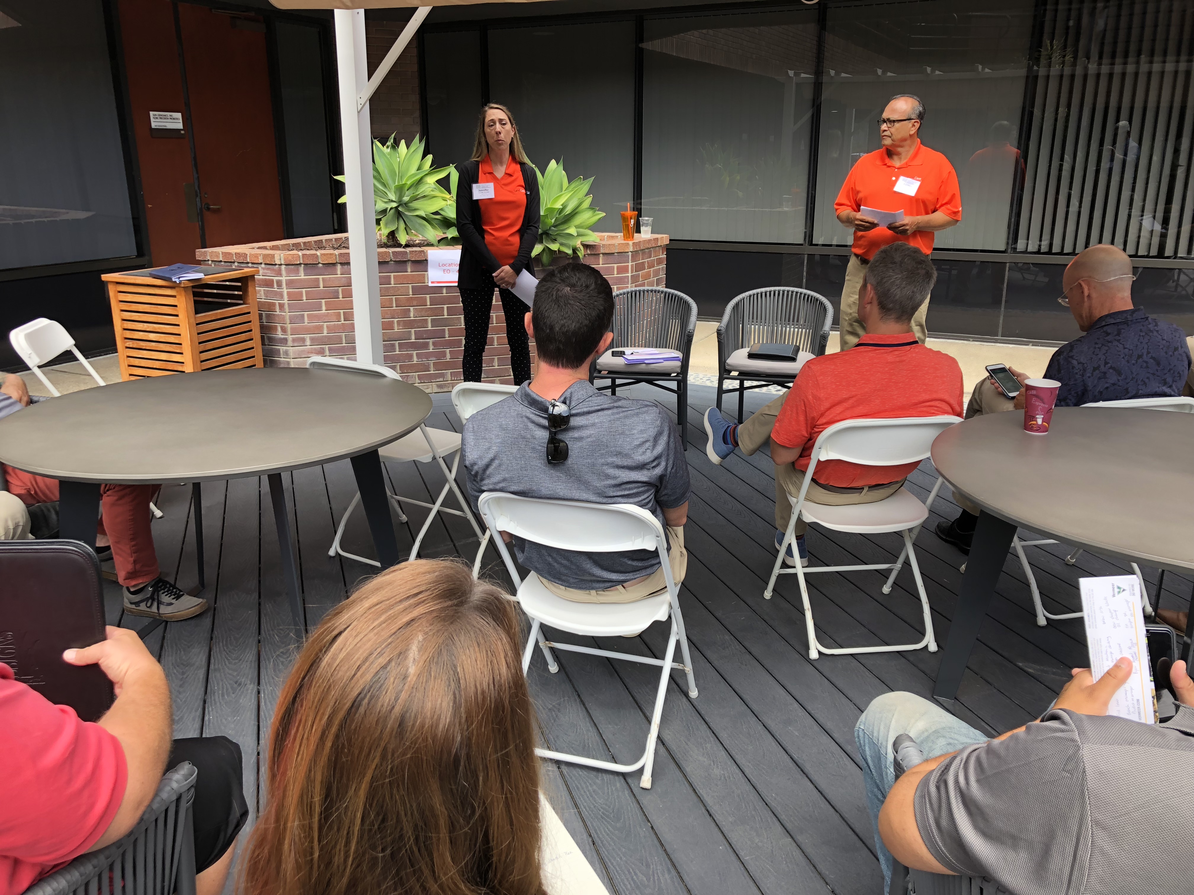 Jennifer Burnett and Ramon Ulloa discuss training and development of LandCare's employees. (Photo: Seth Jones)