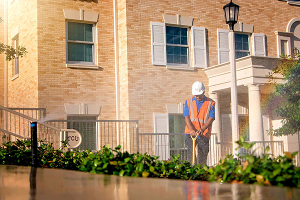 Crew member working (Photo: Andy's Sprinkler, Drainage & Lighting)