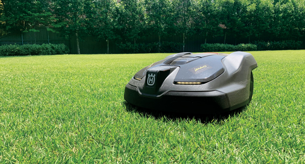 LABOR SAVER Installing robotic mowers on residential properties can help cut down on man-hours. Photo: Husqvarna