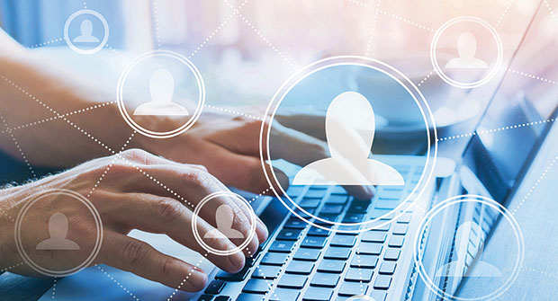 Hands typing at keyboard (Photo: iStock.com/anyaberkut)