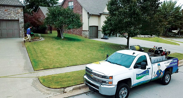 LawnAmerica truck and spray operator (Photo: Chris Seagraves)