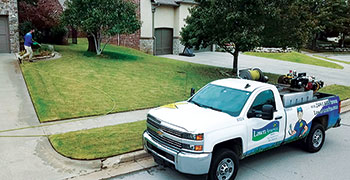 Lawn care truck and spray operator (Photo: Chris Seagraves)