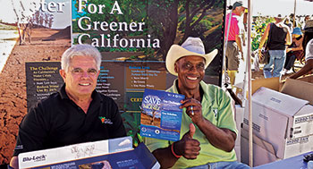 Ed Wallace was the first African American president of the Orange County chapter of the California Landscape Contractors Association. Wallace and fellow contractor, Richard Cohen, man a CLCA booth. (Photo: Ed Wallace)