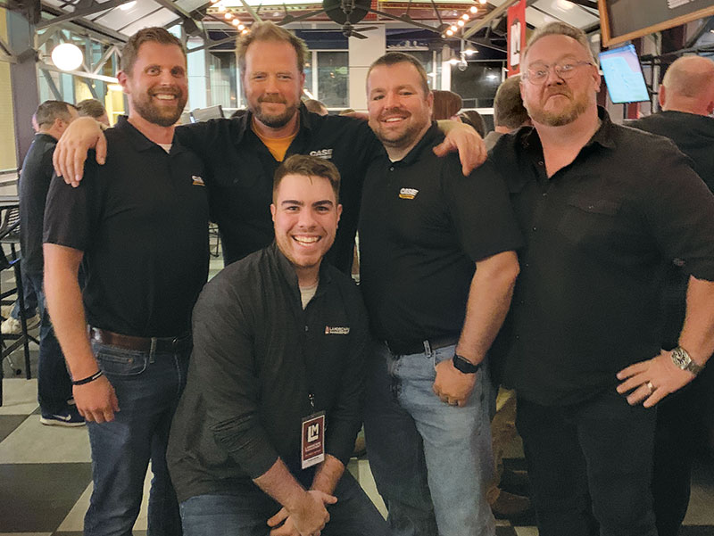 Men in black No, that’s not the band … that’s Tyler Gunter (bottom center) digital media content producer for LM, with members of the Case team at GIE+Expo, including Dan Cooper, Bill Elverman, Garrett Campbell and Brandon Jaynes. Photo: LM Staff